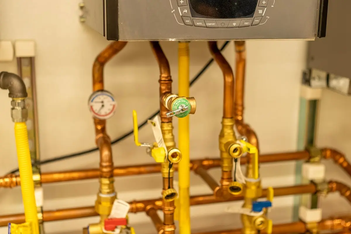 Licensed technician providing Backflow Prevention for a homeowner in Traverse City